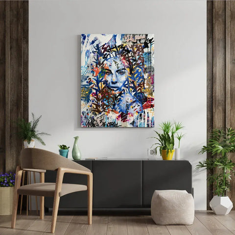 A large abstract painting on a wall in a living room