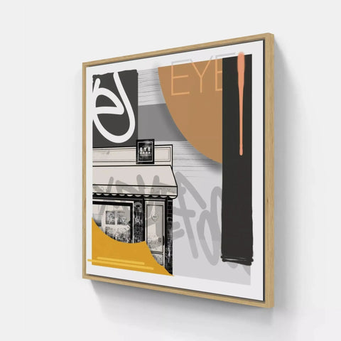 A framed print of a building with a yellow and black design