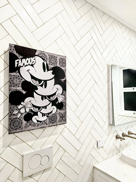 Black and white cartoon-style artwork featuring Mickey Mouse on a canvas.