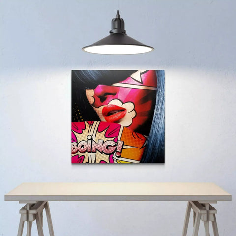 Pop art canvas featuring comic book style ’BOING!’ text with red lips.