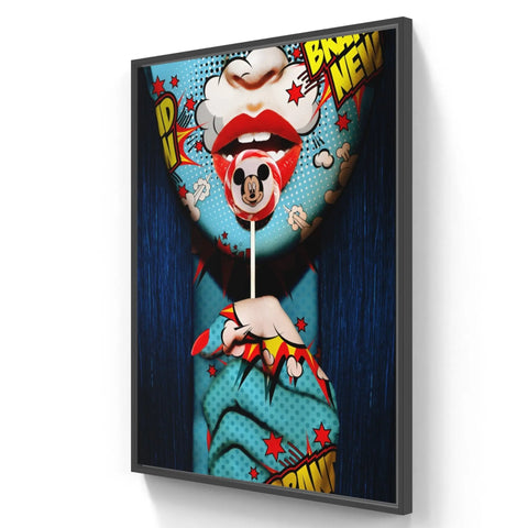 Framed pop art-style painting featuring red lips holding a Mickey Mouse lollipop.