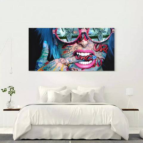 A bed with a painting on it