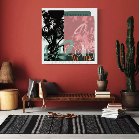 A living room with a red wall and a black and white rug