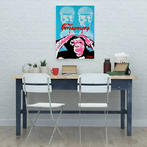 Simple desk setup with two white folding chairs and a colorful pop art poster above.