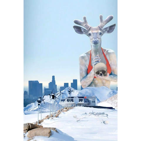 A reindeer with a red harness is in the air