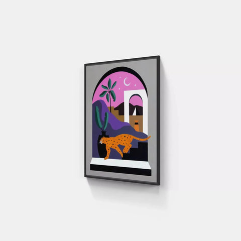 A framed print of a cat and a dog in a window