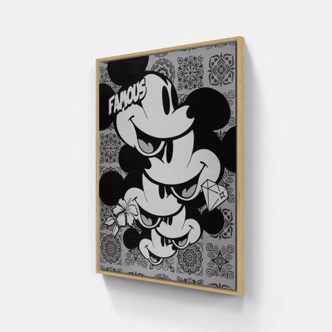 A black and white mickey mouse painting on a wall