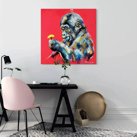 A painting of a gorilla eating a banana