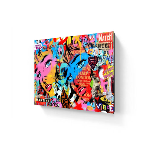 Colorful graffiti-style pop art canvas featuring vibrant eyes, text, and abstract designs.