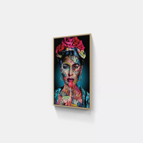 A framed print of a woman with flowers on her head