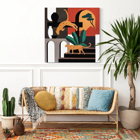 A couch with a colorful rug and a painting on the wall