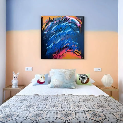 A painting on the wall above a bed