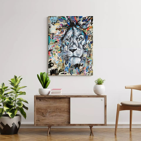 A large canvas with a painting of a lion on it