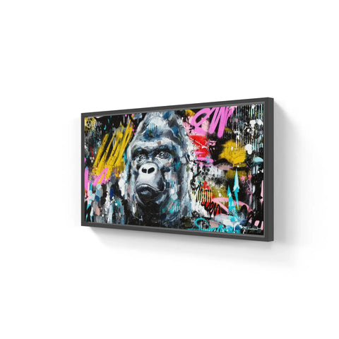 A large framed painting of a gorilla on a white wall