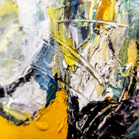 A close up of a painting with a yellow background