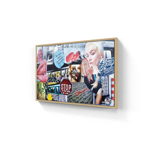 Framed collage artwork featuring urban imagery, pop culture elements, and a blonde figure.