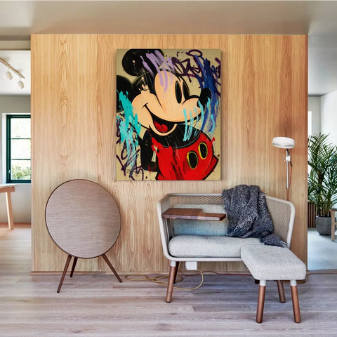 A painting of mickey mouse on a wall