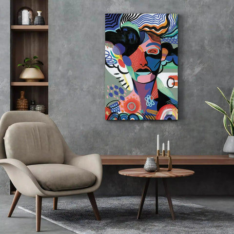 A living room with a chair and a painting on the wall