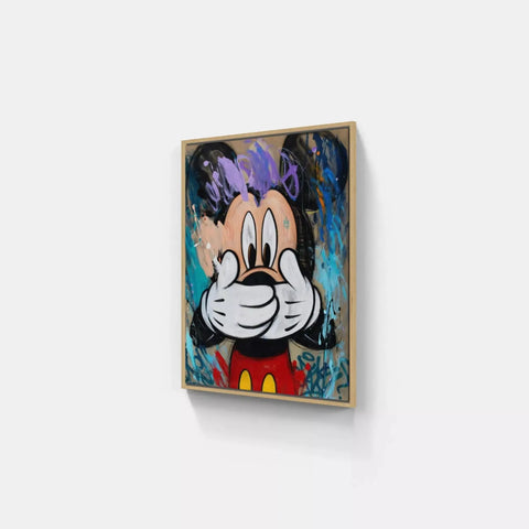 A painting of a mickey mouse on a wall