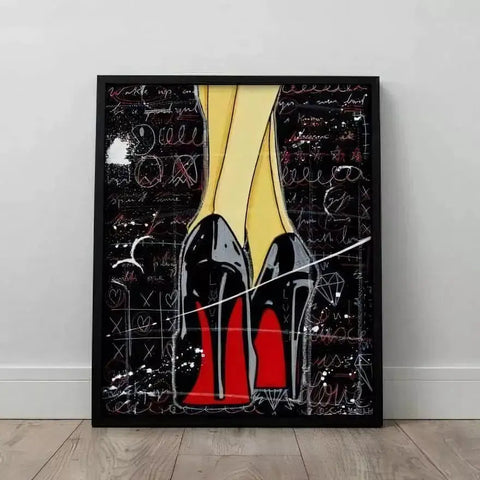 A black framed with a red shoe on it