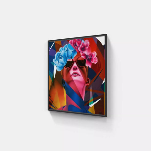 A framed art piece with a woman wearing sunglasses and flowers