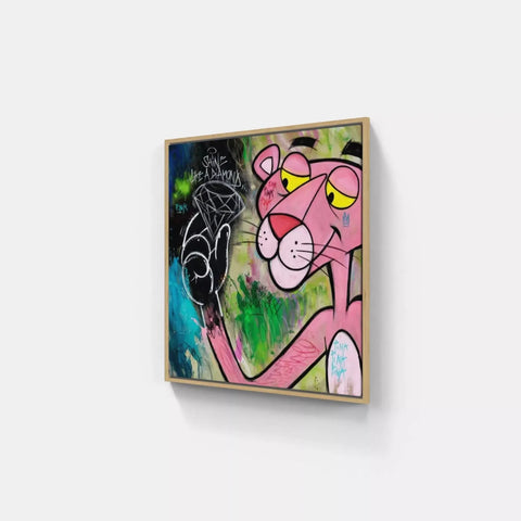 A painting of a pink panther on a white wall