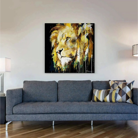 A lion painting on a wall in a living room