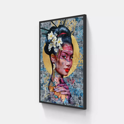 A framed print of a woman with flowers in her hair