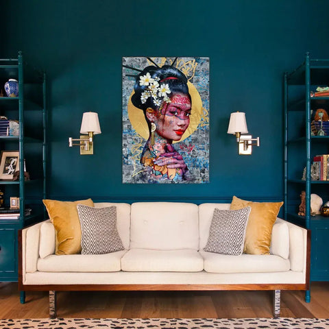 A living room with a couch and a painting on the wall