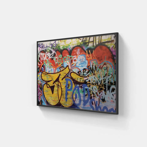 A large framed painting of graffiti on a wall