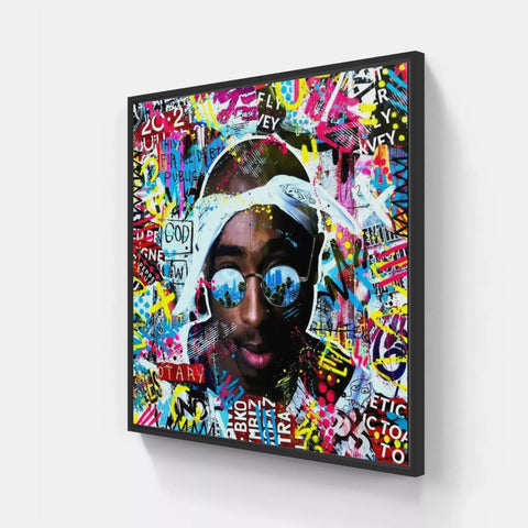 A large framed painting of a rapper with graffiti on it