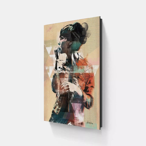 A woman with a guitar canvas print