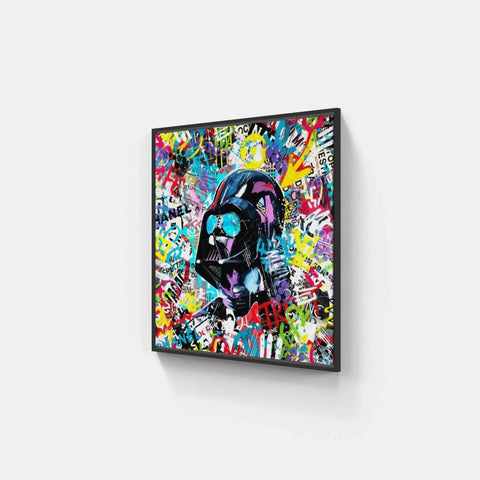 A large black framed painting of a black cat with colorful graffiti on it